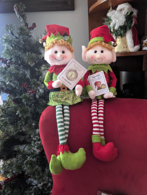 Magic Mentor Elf plush dolls from the Santa Legacy Gift Box. Choose boy or girl elf to guide your family’s Christmas Magic.