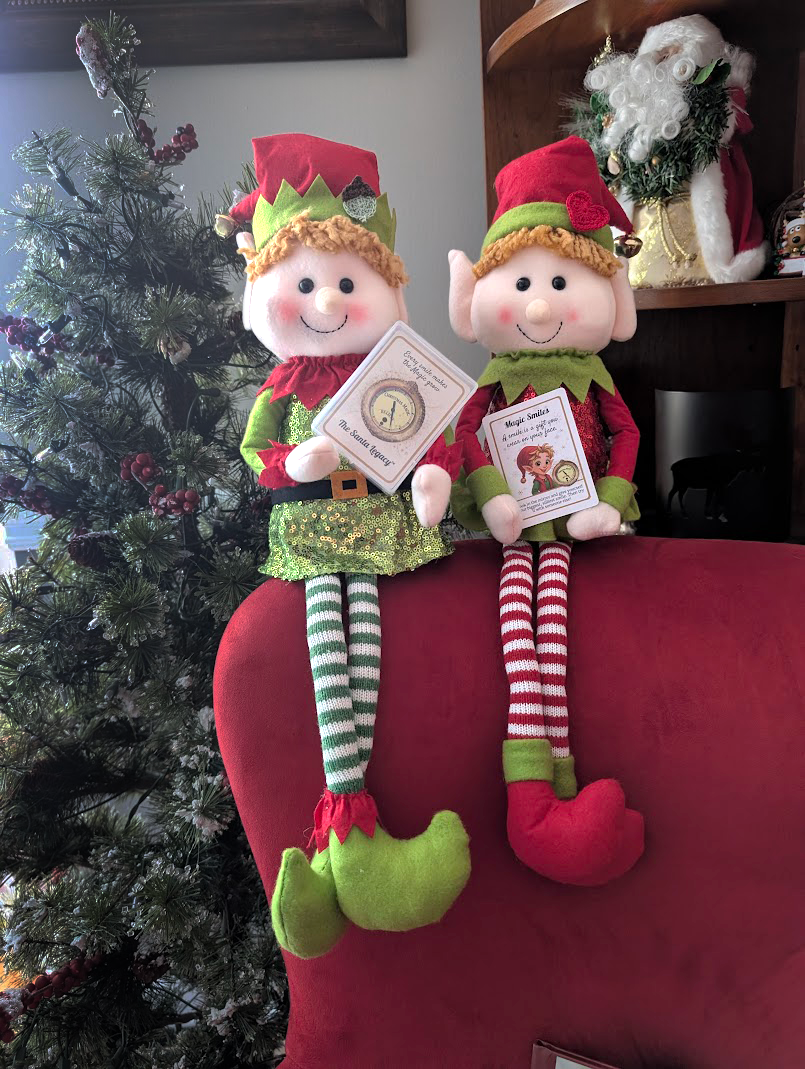 Magic Mentor Elf plush dolls from the Santa Legacy Gift Box. Choose boy or girl elf to guide your family’s Christmas Magic.